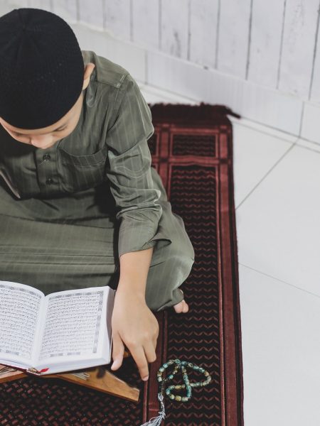 muslim-boy-reading-holy-quran-2021-08-30-06-01-29-utc-min